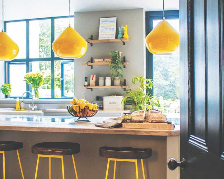 mobile kitchen island and bespoke kitchen fitted with handmade cabinets