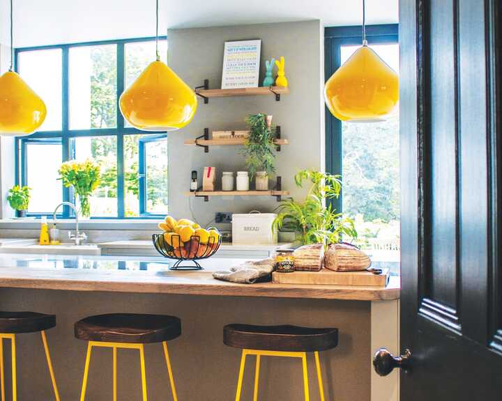 mobile kitchen island and bespoke kitchen fitted with handmade cabinets