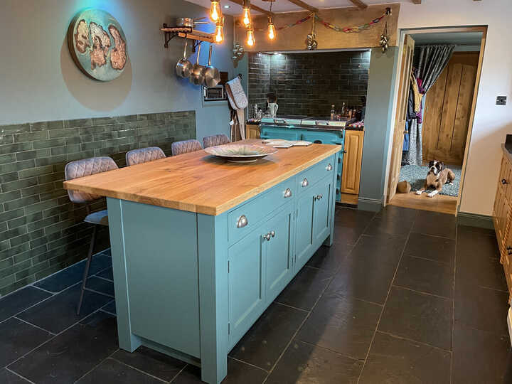 handmade blue cabinets on a mobile kitchen island