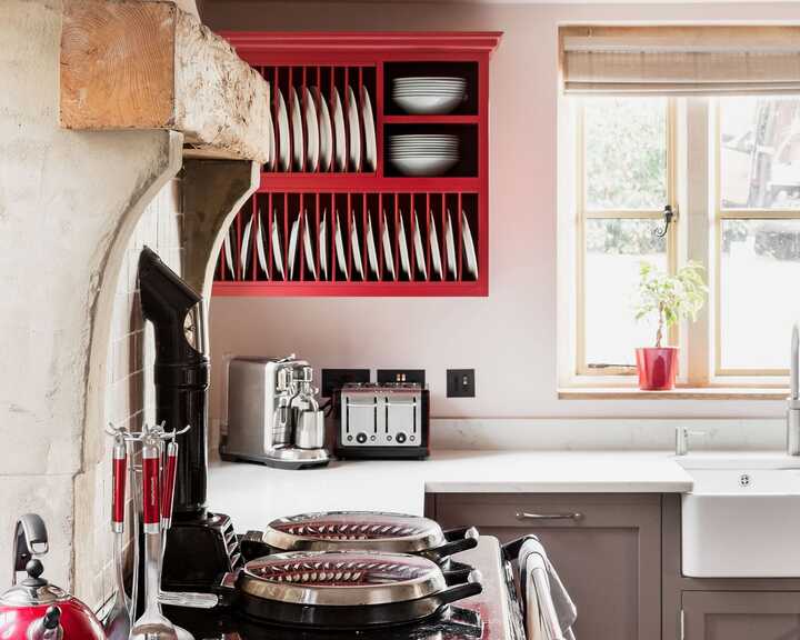 mobile kitchen island and bespoke kitchen fitted with handmade cabinets