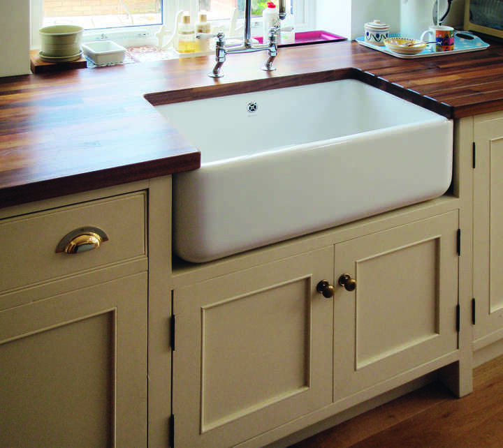 handmade wooden kitchen worktop with a large Belfast sink 